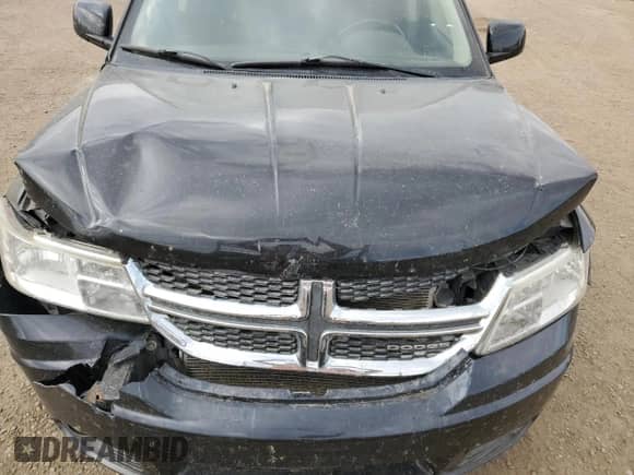 2011 Dodge Journey SXT с VIN 3D4PG5FG7BT511287, выставлен на аукционе Copart как лот 84292705 с пробегом 155 732 миль миль и Списание • Salvage title. История ставок и продаж доступна на DreamBid. Изображение 12.