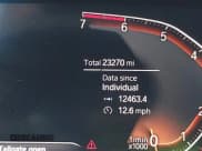 ✅ 2023 BMW 2 Series 228i xDrive • VIN: WBA73AK09P7M11999 • Lot: 42607008. Listed on IAAI with 23,271 mi. Free auction sales archive from the USA and detailed vehicle history report at DreamBid. Image 12.