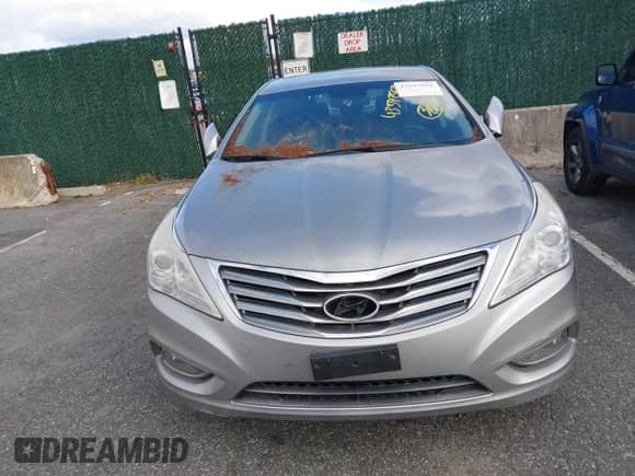 2013 Hyundai Azera with VIN KMHFG4JG3DA329523, listed as a IAAI auction lot 43593562 with 93,702 mi miles and . Bid and sale history available at DreamBid. Image 6.
