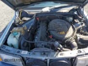 ✅ 1989 Mercedes-Benz 190 • VIN: WDBDA29D0KF609460 • Lot: 76746744. Wystawiony na Copart z przebiegiem 57 439 mil. Bezpłatny archiwum sprzedaży aukcyjnych z USA i szczegółowy raport historii pojazdu na DreamBid. Zdjęcie 11.