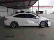 2015 Toyota Camry LE z VIN 4T1BD1FK2FU142956, wystawiony jako IAAI lot #42068502 z przebiegiem 104 135 mil mil oraz . Historia ofert i sprzedaży dostępna na DreamBid. Obrazek 14.