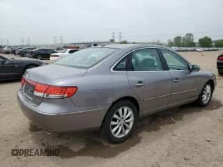 ✅ 2007 Hyundai Azera SE • VIN: KMHFC46FX7A240385 • Лот: 60710185. Размещён на Copart с пробегом 133 626 миль миль. Получите бесплатный доступ к архиву аукционных продаж из США и посмотрите подробный отчёт об истории автомобиля на DreamBid. Изображение 3.