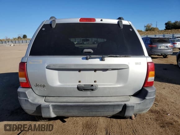 ✅ 2004 Jeep Grand Cherokee Laredo • VIN: 1J4GW48S04C306611 • Lot: 89533875. Listed on Copart with 199,411 mi. Free auction sales archive from the USA and detailed vehicle history report at DreamBid. Image 6.