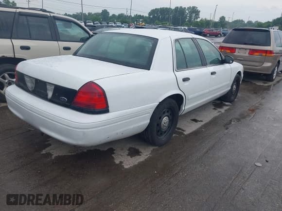 ✅ 2008 Ford Police Interceptor • VIN: 2FAFP71V08X162688 • Lot: 42634073. Listed on IAAI with 144,137 mi. Free auction sales archive from the USA and detailed vehicle history report at DreamBid. Image 4.