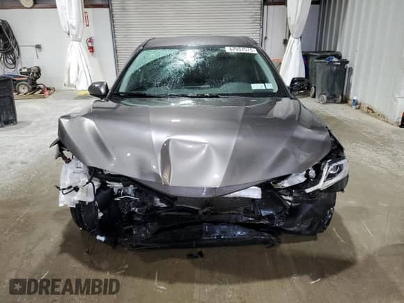 2023 Toyota Camry LE с VIN 4T1C11BK7PU097260, выставлен на аукционе Copart как лот 67957575 с пробегом 21 092 миль миль и Списание • Salvage title. История ставок и продаж доступна на DreamBid. Изображение 5.