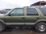 ✅ 2001 Chevrolet Blazer LT • VIN: 1GNDT13W212133371 • Lot: 41516111. Wystawiony na IAAI z przebiegiem 175 607 mil. Bezpłatny archiwum sprzedaży aukcyjnych z USA i szczegółowy raport historii pojazdu na DreamBid. Zdjęcie 13.