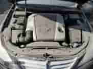 2009 Hyundai Genesis z VIN KMHGC46E59U025719, wystawiony jako Copart lot #78093124 z przebiegiem 145 837 mil mil oraz Czysty tytuł • Clean title. Historia ofert i sprzedaży dostępna na DreamBid. Obrazek 11.