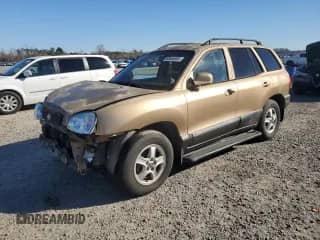 2001 Hyundai Santa Fe GLS z VIN KM8SC83D91U100729, wystawiony jako Copart lot #88556085 z przebiegiem 80 584 mil mil oraz Szkoda całkowita • Salvage title. Historia ofert i sprzedaży dostępna na DreamBid. Obrazek 1.