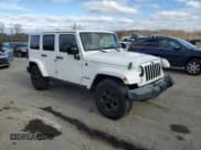 ✅ 2015 Jeep Wrangler Unlimited Sahara • VIN: 1C4HJWEG8FL726642 • Lot: 93007935. Listed on Copart with 173,386 mi. Free auction sales archive from the USA and detailed vehicle history report at DreamBid. Image 4.