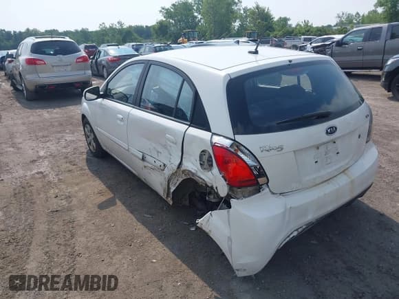 ✅ 2010 Kia Rio LX • VIN: KNADH5A39A6646679 • Lot: 42598556. Listed on IAAI with 119,026 mi. Free auction sales archive from the USA and detailed vehicle history report at DreamBid. Image 3.