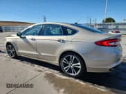 ✅ 2017 Ford Fusion Titanium • VIN: 3FA6P0D93HR299242 • Лот: 90472725. Опубликован ранее на Copart с пробегом 26 770 миль. Бесплатный доступ к архиву аукционных продаж из США и подробный отчёт об истории автомобиля на DreamBid. Изображение 2.