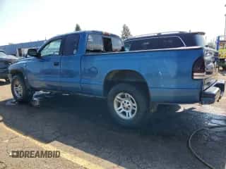 2002 Dodge Dakota Sport z VIN 1B7GG32NX2S616395, wystawiony jako Copart lot #70294944 z przebiegiem 205 067 mil mil oraz Czysty tytuł • Clean title. Historia ofert i sprzedaży dostępna na DreamBid. Obrazek 2.