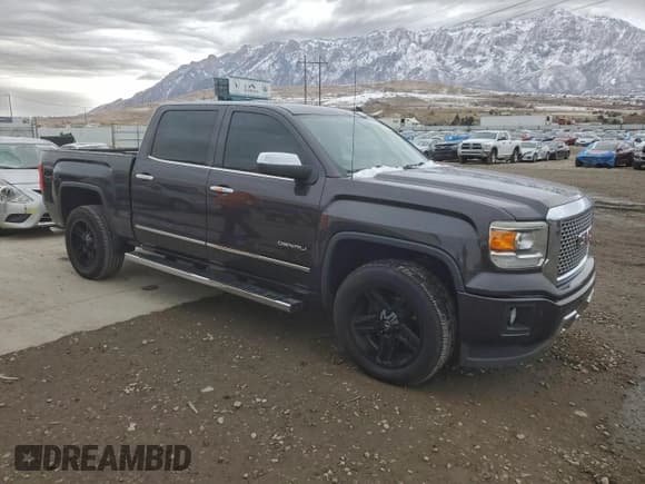 ✅ 2014 GMC Sierra 1500 Denali • VIN: 3GTU2WECXEG399889 • Lot: 94828205. Listed on Copart with 123,874 mi. Free auction sales archive from the USA and detailed vehicle history report at DreamBid. Image 4.