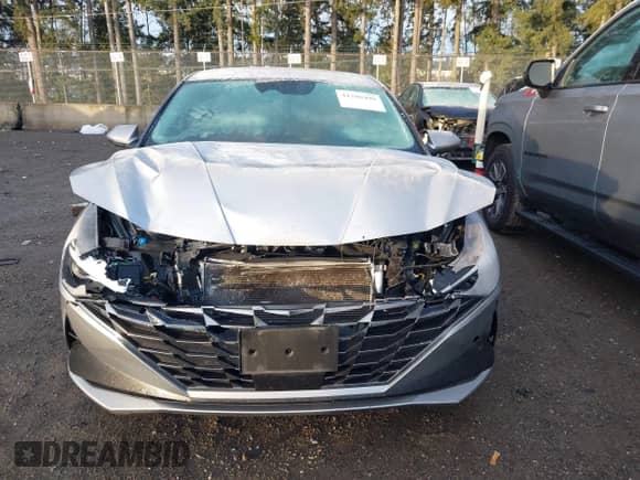 2021 Hyundai Elantra SEL z VIN 5NPLN4AG1MH012443, wystawiony jako IAAI lot #41209499 z przebiegiem 57 829 mil mil oraz . Historia ofert i sprzedaży dostępna na DreamBid. Obrazek 13.