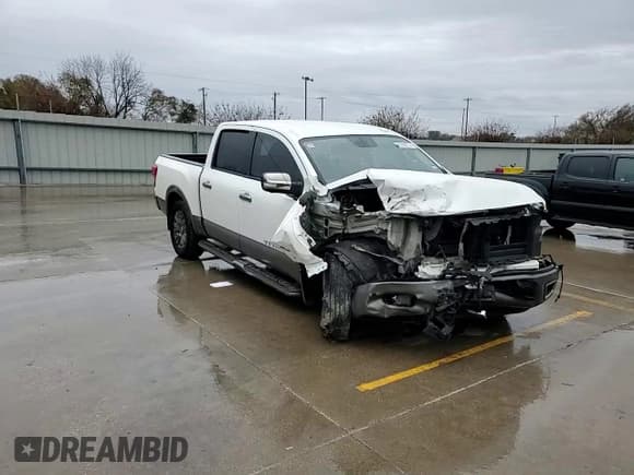 ✅ 2019 Nissan Titan Platinum Reserve • VIN: 1N6AA1E55KN500573 • Lot: 82708714. Listed on Copart with 115,286 mi. Free auction sales archive from the USA and detailed vehicle history report at DreamBid. Image 11.