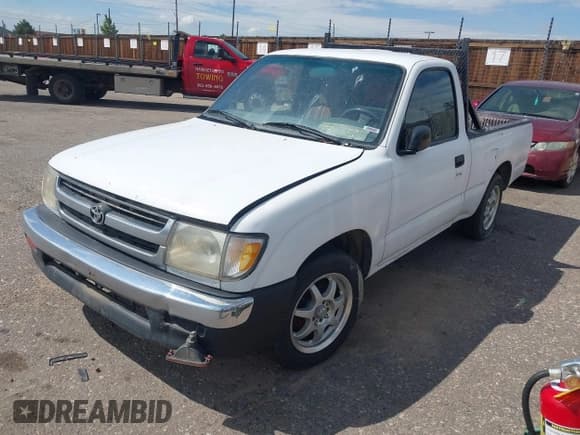 ✅ 1999 Toyota Tacoma • VIN: 4TANL42N4XZ481305 • Лот: 42586595. Опубликован ранее на IAAI с пробегом 239 303 миль. Бесплатный доступ к архиву аукционных продаж из США и подробный отчёт об истории автомобиля на DreamBid. Изображение 2.