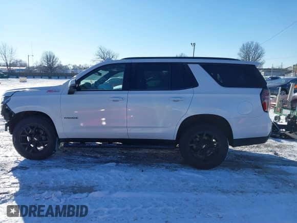 2022 Chevrolet Tahoe Z71 z VIN 1GNSKPKD6NR146098, wystawiony jako IAAI lot #41340984 z przebiegiem 44 082 mil mil oraz . Historia ofert i sprzedaży dostępna na DreamBid. Obrazek 15.