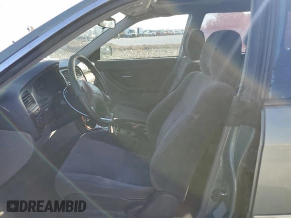 ✅ 2003 Subaru Legacy L • VIN: 4S3BH635037303500 • Lot: 47126905. Listed on Copart with 168,793 mi. Free auction sales archive from the USA and detailed vehicle history report at DreamBid. Image 7.