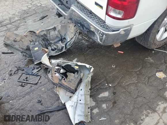 2009 Dodge 1500 SLT z VIN 1D3HV18P69S811788, wystawiony jako Copart lot #71262434 z przebiegiem 207 941 mil mil oraz Szkoda całkowita • Salvage title. Historia ofert i sprzedaży dostępna na DreamBid. Obrazek 12.