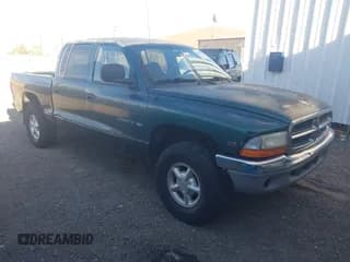 ✅ 2000 Dodge Dakota Sport • VIN: 1B7HG2AZ4YS724393 • Lot: 43645937. Listed on IAAI with 144,705 mi. Free auction sales archive from the USA and detailed vehicle history report at DreamBid. Image 1.