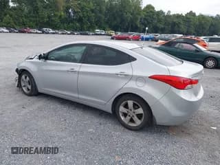 ✅ 2013 Hyundai Elantra GLS • VIN: KMHDH4AE8DU829579 • Lot: 42940329. Listed on IAAI with 153,115 mi. Free auction sales archive from the USA and detailed vehicle history report at DreamBid. Image 3.