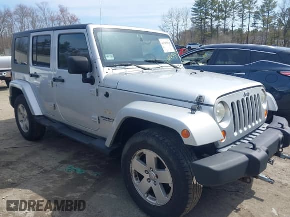 ✅ 2007 Jeep Wrangler Unlimited Sahara • VIN: 1J4GA59167L195254 • Lot: 41945934. Listed on IAAI with 252,496 mi. Free auction sales archive from the USA and detailed vehicle history report at DreamBid. Image 1.