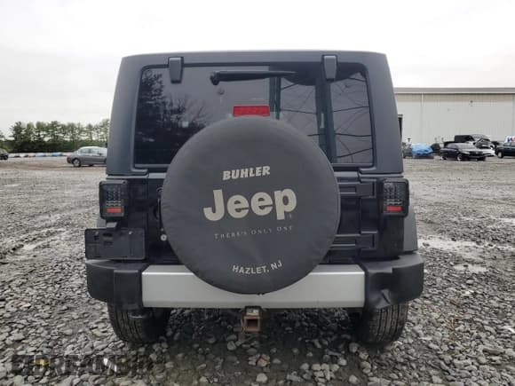 ✅ 2011 Jeep Wrangler Sahara • VIN: 1J4AA5D16BL517963 • Lot: 69210635. Listed on Copart with 171,839 mi. Free auction sales archive from the USA and detailed vehicle history report at DreamBid. Image 6.