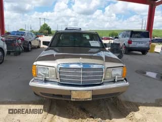 ✅ 1987 Mercedes-Benz 420 SEL • VIN: WDBCA35DXHA340557 • Лот: 42507501. Опубликован ранее на IAAI с пробегом 69 027 миль. Бесплатный доступ к архиву аукционных продаж из США и подробный отчёт об истории автомобиля на DreamBid. Изображение 6.