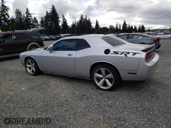 2010 Dodge Challenger SRT-8 z VIN 2B3CJ7DW7AH270018, wystawiony jako Copart lot #72088594 z przebiegiem Nie podano mil oraz Szkoda całkowita • Salvage title. Historia ofert i sprzedaży dostępna na DreamBid. Obrazek 2.