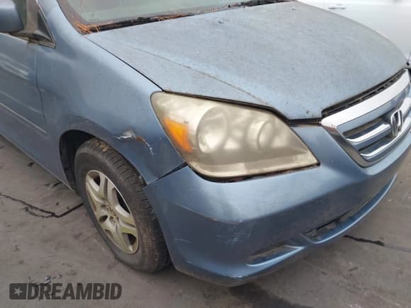 ✅ 2006 Honda Odyssey EX-L • VIN: 5FNRL38676B107971 • Lot: 43868101. Listed on IAAI with 199,894 mi. Free auction sales archive from the USA and detailed vehicle history report at DreamBid. Image 6.