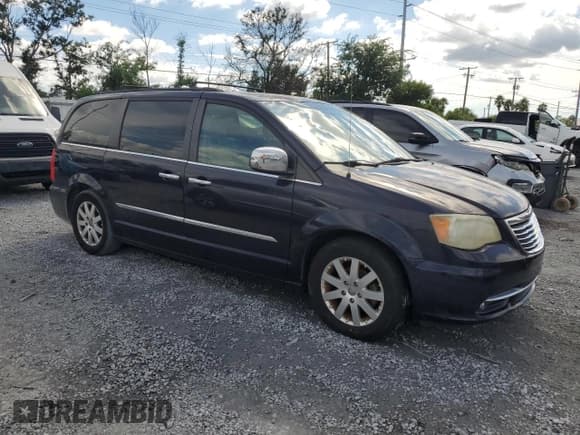 ✅ 2011 Chrysler Town & Country Touring L • VIN: 2A4RR8DG1BR704083 • Lot: 80318935. Listed on Copart with 118,376 mi. Free auction sales archive from the USA and detailed vehicle history report at DreamBid. Image 4.