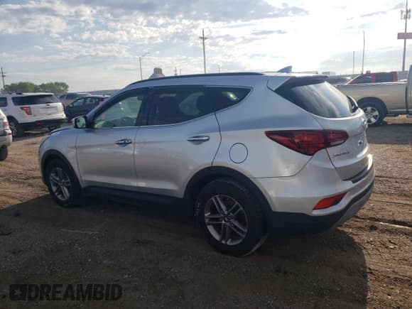 ✅ 2018 Hyundai Santa Fe 2.4L • VIN: 5XYZU3LB4JG554387 • Лот: 62936593. Опубликован ранее на Copart с пробегом Не указан. Бесплатный доступ к архиву аукционных продаж из США и подробный отчёт об истории автомобиля на DreamBid. Изображение 2.