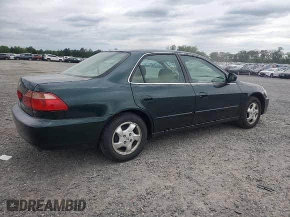 2000 Honda Accord EX с VIN 1HGCG6674YA001515, выставлен на аукционе Copart как лот 56257935 с пробегом 215 030 миль миль и Чистый • Clean title. История ставок и продаж доступна на DreamBid. Изображение 3.
