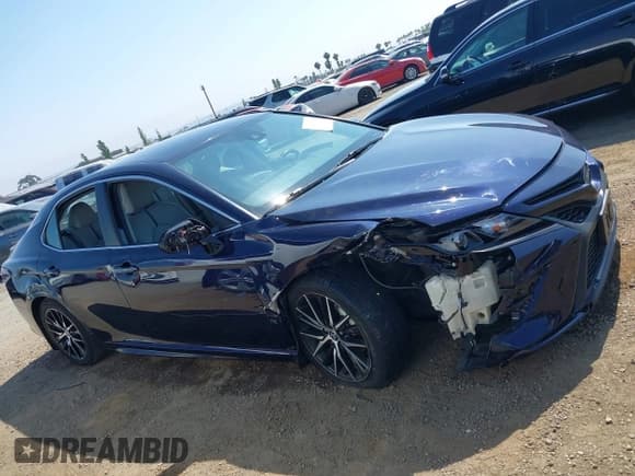 ✅ 2022 Toyota Camry Hybrid SE • VIN: 4T1G31AK9NU038804 • Лот: 42479021. Опубликован ранее на IAAI с пробегом 136 422 миль. Бесплатный доступ к архиву аукционных продаж из США и подробный отчёт об истории автомобиля на DreamBid. Изображение 13.