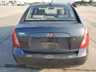 2011 Hyundai Accent GLS z VIN KMHCN4AC8BU620097, wystawiony jako Copart lot #70177664 z przebiegiem 245 022 mil mil oraz Szkoda całkowita • Salvage title. Historia ofert i sprzedaży dostępna na DreamBid. Obrazek 6.