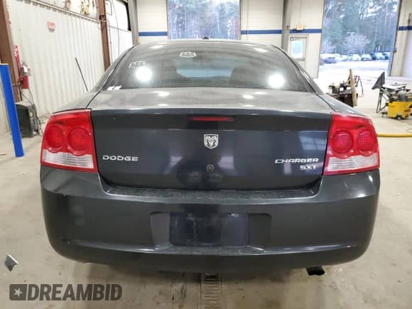 2009 Dodge Charger SXT с VIN 2B3KA33V89H627232, выставлен на аукционе Copart как лот 80537144 с пробегом 259 502 миль миль и Списание • Salvage title. История ставок и продаж доступна на DreamBid. Изображение 6.