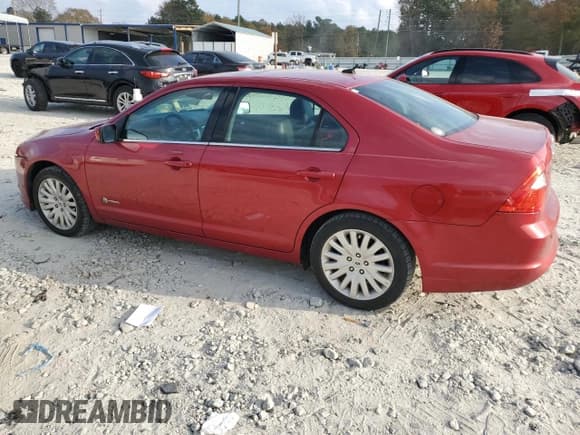 ✅ 2012 Ford Fusion Hybrid • VIN: 3FADP0L33CR190227 • Лот: 94031815. Опубликован ранее на Copart с пробегом 166 343 миль. Бесплатный доступ к архиву аукционных продаж из США и подробный отчёт об истории автомобиля на DreamBid. Изображение 2.