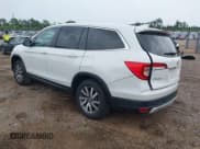 ✅ 2021 Honda Pilot EX-L • VIN: 5FNYF6H56MB064149 • Лот: 42872341. Опубликован ранее на IAAI с пробегом 75 886 миль. Бесплатный доступ к архиву аукционных продаж из США и подробный отчёт об истории автомобиля на DreamBid. Изображение 3.