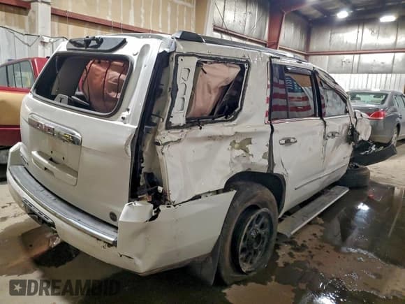 ✅ 2019 GMC Yukon Denali • VIN: 1GKS2CKJ0KR249346 • Lot: 94115105. Listed on Copart with 96,378 mi. Free auction sales archive from the USA and detailed vehicle history report at DreamBid. Image 3.