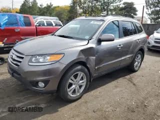 ✅ 2012 Hyundai Santa Fe Limited • VIN: 5XYZKDAG1CG113135 • Lot: 75273574. Listed on Copart with 66,860 mi. Free auction sales archive from the USA and detailed vehicle history report at DreamBid. Image 1.