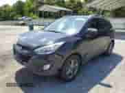 2014 Hyundai Tucson Walking Dead Edition with VIN KM8JUCAG8EU936627, listed as a Copart auction lot 56313984 with 109,412 mi miles and Salvage title. Bid and sale history available at DreamBid. Image 1.