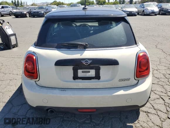 2019 MINI Hardtop Cooper with VIN WMWXP5C52K2H29767, listed as a Copart auction lot 61006445 with 50,212 mi miles and Salvage title. Bid and sale history available at DreamBid. Image 6.