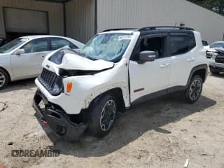 ✅ 2016 Jeep Renegade Trailhawk • VIN: ZACCJBCT0GPE21684 • Lot: 64313765. Listed on Copart with 121,032 mi. Free auction sales archive from the USA and detailed vehicle history report at DreamBid. Image 1.