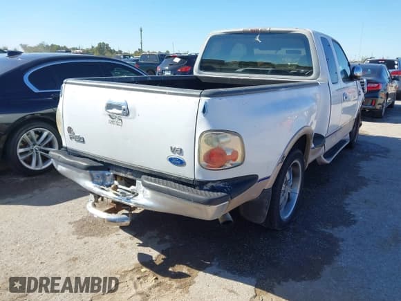 ✅ 1997 Ford F-150 XL • VIN: 2FTDX0765VCA90446 • Lot: 43658347. Listed on IAAI with 129,908 mi. Free auction sales archive from the USA and detailed vehicle history report at DreamBid. Image 4.