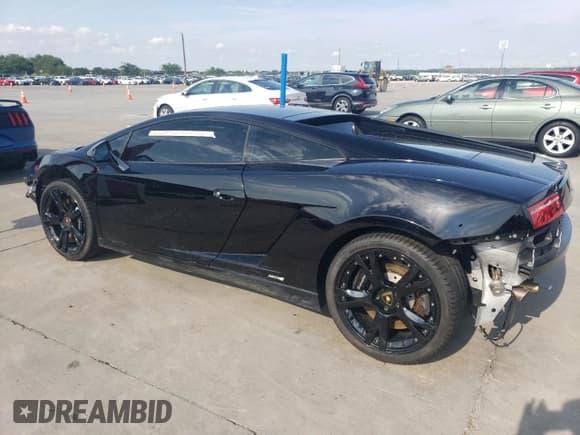 ✅ 2014 Lamborghini Gallardo • VIN: ZHWGU5BZ6ELA13766 • Lot: 64172354. Listed on Copart with 22,043 mi. Free auction sales archive from the USA and detailed vehicle history report at DreamBid. Image 2.
