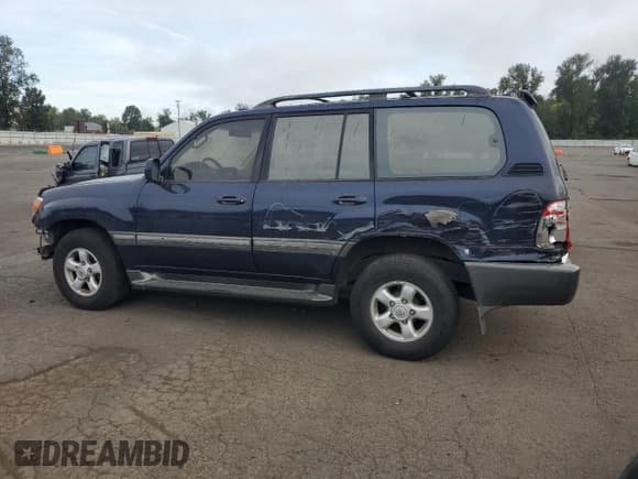 ✅ 2000 Toyota Land Cruiser • VIN: JT3HT05J0Y0082257 • Lot: 63392145. Listed on Copart with 355,619 mi. Free auction sales archive from the USA and detailed vehicle history report at DreamBid. Image 2.