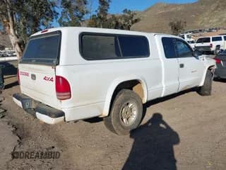 ✅ 1998 Dodge Dakota SLT • VIN: 1B7GG22Y6WS558179 • Lot: 41673558. Wystawiony na IAAI z przebiegiem 252 084 mil. Bezpłatny archiwum sprzedaży aukcyjnych z USA i szczegółowy raport historii pojazdu na DreamBid. Zdjęcie 4.