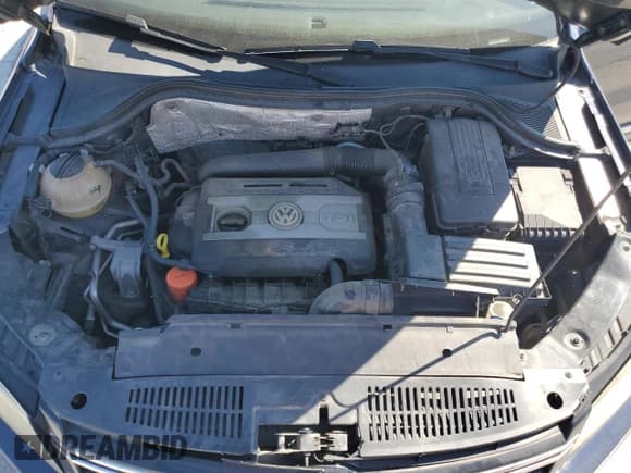 ✅ 2016 Volkswagen Tiguan S • VIN: WVGAV7AX7GW036622 • Lot: 84413245. Listed on Copart with 99,346 mi. Free auction sales archive from the USA and detailed vehicle history report at DreamBid. Image 12.