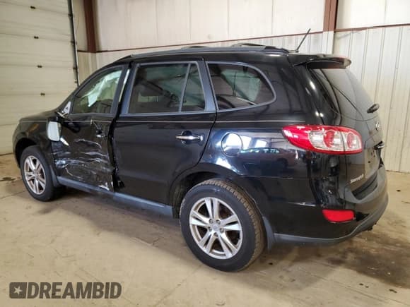 ✅ 2012 Hyundai Santa Fe Limited • VIN: 5XYZKDAG1CG109277 • Lot: 87080084. Listed on Copart with 86,219 mi. Free auction sales archive from the USA and detailed vehicle history report at DreamBid. Image 2.