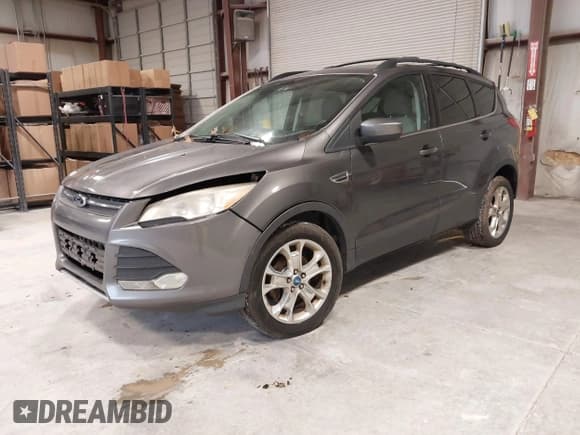✅ 2013 Ford Escape SE • VIN: 1FMCU0GX1DUA84084 • Lot: 43845906. Listed on IAAI with 243,517 mi. Free auction sales archive from the USA and detailed vehicle history report at DreamBid. Image 2.